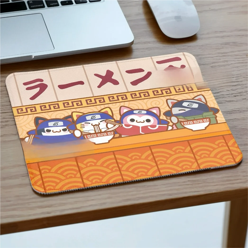 Vibrant Naruto: Team Kakashi Mouse Pad showcasing heroic anime artwork of iconic characters with cat design, a premium collectible design for ultimate fans.