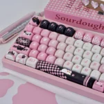 Gallery of the charming Naughty Cat PBT artisan keycap set at various angles, highlighting its premium dye-sub design and smooth MOA profile for mechanical keyboard.