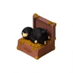 Handcrafted Niffler artisan resin keycap, intricately sculpted. This gallery image highlights its rich dark tones and whimsical fantasy details.