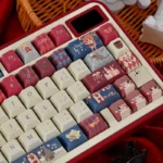 Whimsical Nutcracker PBT Dye-Sub Keycaps Set, from a unique angle, showcasing vibrant festive colors and enchanting ballet character designs.