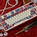 This artistic angle of the Nutcracker Keycaps Set showcases enchanting ballet motifs, vibrant festive colors, and whimsical character illustrations.