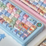 Multiple angles of adorable chibi Overwatch hero keycaps set, featuring vibrant colors and intricate details, perfect collectible additions for any gamers.
