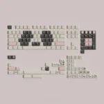 Artistic Panda PBT keycaps set: durable PBT, crisp dye-sub legends, charming panda motif. Minimalist design, warm aesthetic.