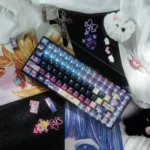 Vibrant Panty Stocking keycaps set for anime keyboard sets, showcasing bold character art from various angles. This exclusive set brings a playful touch.