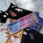 A playful close-up of the exclusive Vibrant Panty Stocking Keycaps Set, showcasing various anime character designs and bold colors from different angles.