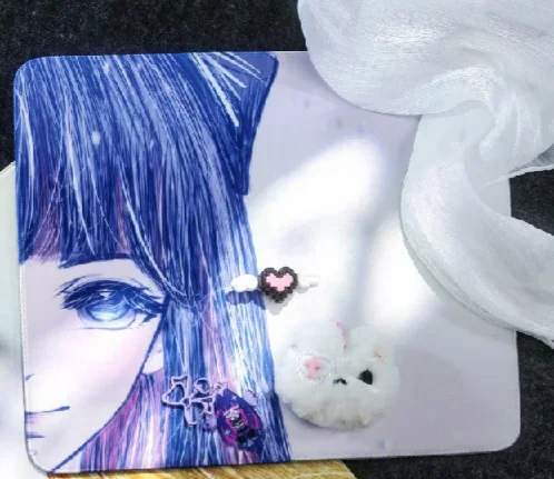A vivid, playful close-up of the exclusive Panty Stocking anime mouse pad, showcasing the iconic character art and vibrant colors. Enhance your desk!