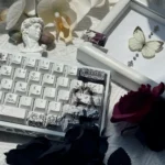 Detailed view of Elegance PBT Black White Keycaps Set showcasing durable PBT material, stark black and white contrast, and intricate five-side sublimation.