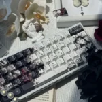 Main image of Elegance PBT Black White Keycaps Set, highlighting durable PBT and crisp five-sided dye-sublimation for an elegant, mystical aesthetics.