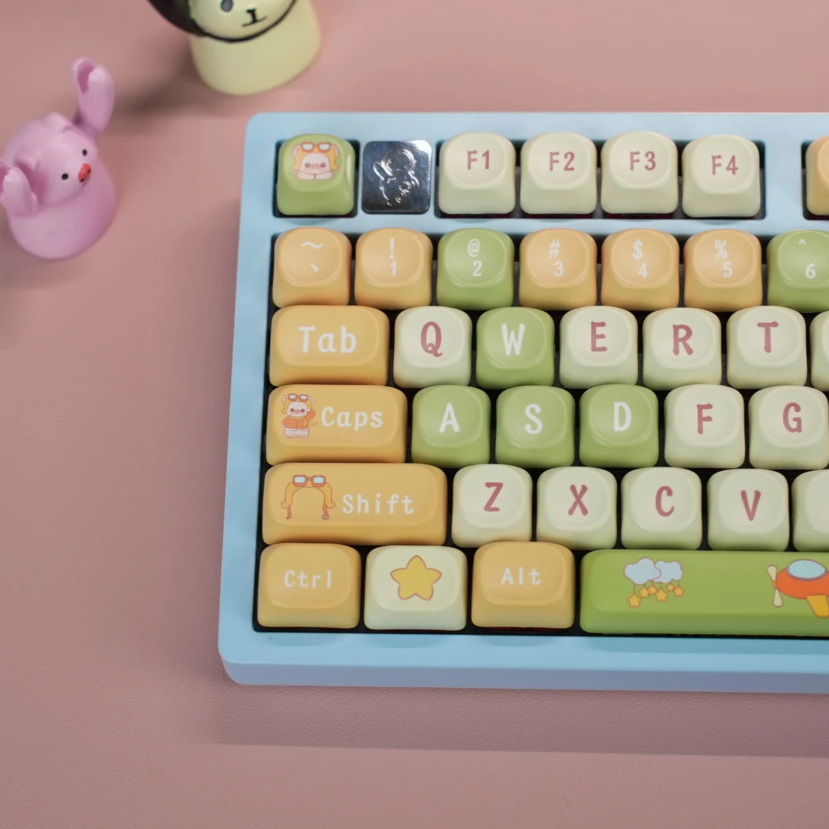 A collection of adorable Pig Pilot PBT MOA keycaps Set from various angles, showcasing the unique MOA profile and playful aviation-themed designs.