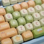 Adorable Pig Pilot PBT MOA keycap set, displaying playful pig pilots, cloud designs, and unique profile from various angles for aviation fun.