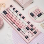Adorable Pink Bear PBT MOA keycap set from multiple angles, highlighting the whimsical line art bear and soft pastel pink PBT for a cute desktop.