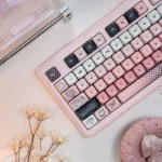 Close-up of the adorable Pink Bear PBT MOA Keycap Set, featuring the whimsical line art bear and soft pastel pink PBT texture from a charming angle.