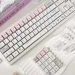Whimsical Dazed Cat Keycap Set showcased from multiple angles, featuring adorable pastel colors and versatile backlit options for charming keyboard.