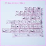 A playful collection of translucent PBT Miffy keycaps set with charming pink dye-sub illustrations, showcasing various angles of the iconic side-printed design.