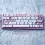 Iconic Miffy PBT Dye-Sub Translucent Keycap Set for a playful look. Features charming pink Miffy illustrations on translucent, side-printed keycaps.