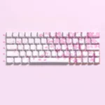Playful pink Miku Nakano PBT side-lit 64-key set, featuring vibrant anime art for exclusive Miku Nakano keycaps.