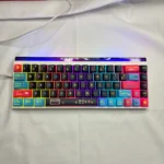 A collection of vibrant retro arcade Pixel Video Games art PBT keycaps set, showcasing their unique side-lit translucent legends from multiple playful angles.