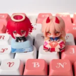 Vibrant, handcrafted Power Chainsaw Man resin keycap showcased from multiple angles, revealing its intricate, dynamic anime character sculpting design.