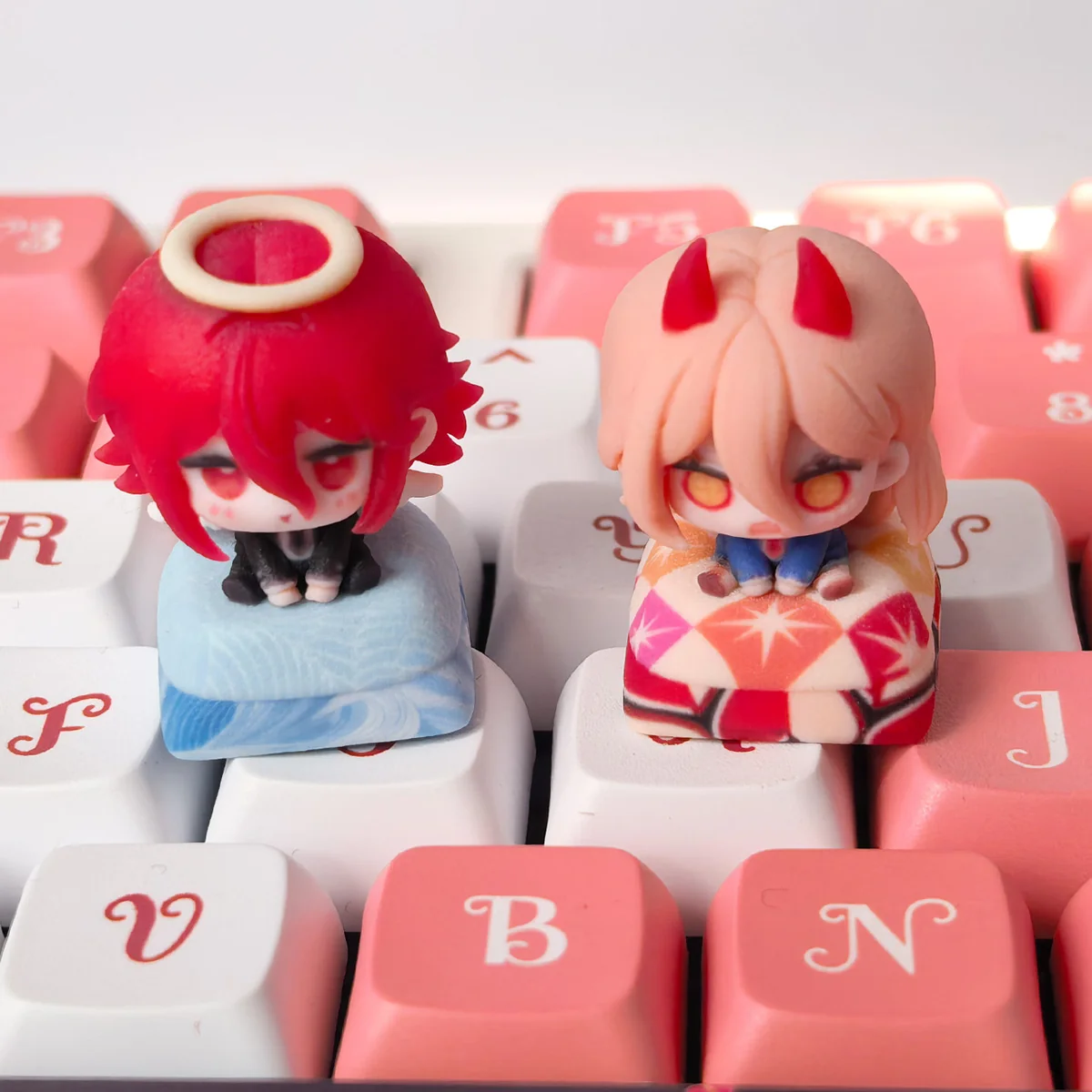 Vibrant, handcrafted Power Chainsaw Man resin keycap showcased from multiple angles, revealing its intricate, dynamic anime character sculpting design.