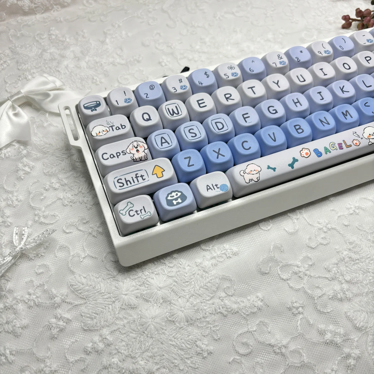 Whimsical Puppy Bagel PBT MOA keycaps set, featuring adorable puppy and bagel illustrations in soft colors, displayed from various angles. Durable PBT material.