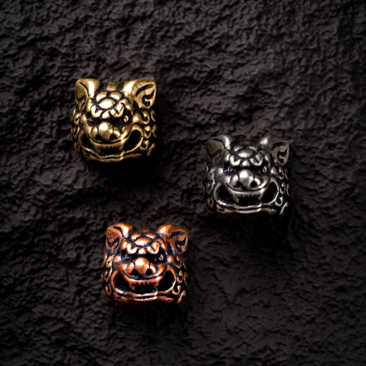 A detailed view of the artisan pure copper Qilin keycap, highlighting its intricate mythical sculpture and rich metallic luster, embodying a traditional design.