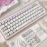 Purple Dazed Cat Series Keycap Set showcasing various profiles and charming minimalist cat designs in pastel and vibrant colors for a playful keyboard.