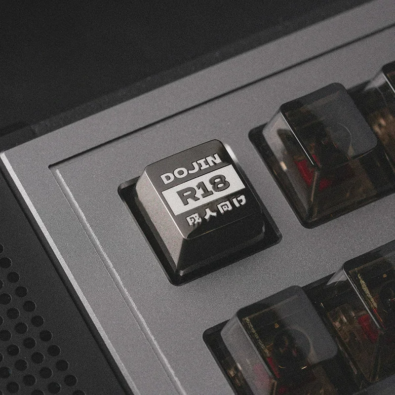 Dramatic close-up of the Night Demon R18 dark cinematic zinc alloy artisan keycap, revealing its exclusive, intricate demonic design.