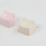 Adorable handcrafted resin bear artisan keycap, displayed from a charming new angle, showcasing its intricate details and soft pastel shades, perfect for customization set.