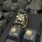 Premium handcrafted Retro Fortune Cat Keycaps. An alternate view showcases its intricate sculpted metallic and polished finish, symbolizing good fortune.