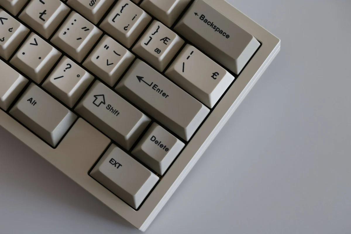 A close-up view of the SAW Retro PBT Keycaps Set, showcasing their premium sculpted profile and vintage aesthetic, perfect for a classic keyboard.