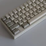 SAW Retro PBT Keycaps set, showcasing premium sculpted vintage keycaps in a clean palette, perfect for a classic computing aesthetic.