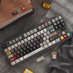 Retro Synthesizer Keycaps Set from various angles, showcasing their distinct vintage synth design, wide keyboard compatibility, and nostalgic electronic art.