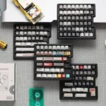 Retro Synthesizer Keycaps Set displaying their distinct vintage synth design from multiple angles, emphasizing wide keyboard compatibility and nostalgic design.