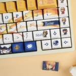 Saber PBT keycap set, exclusive Fate/Stay Night Noble Spirit. Multiple artistic angles showcase iconic anime legends.
