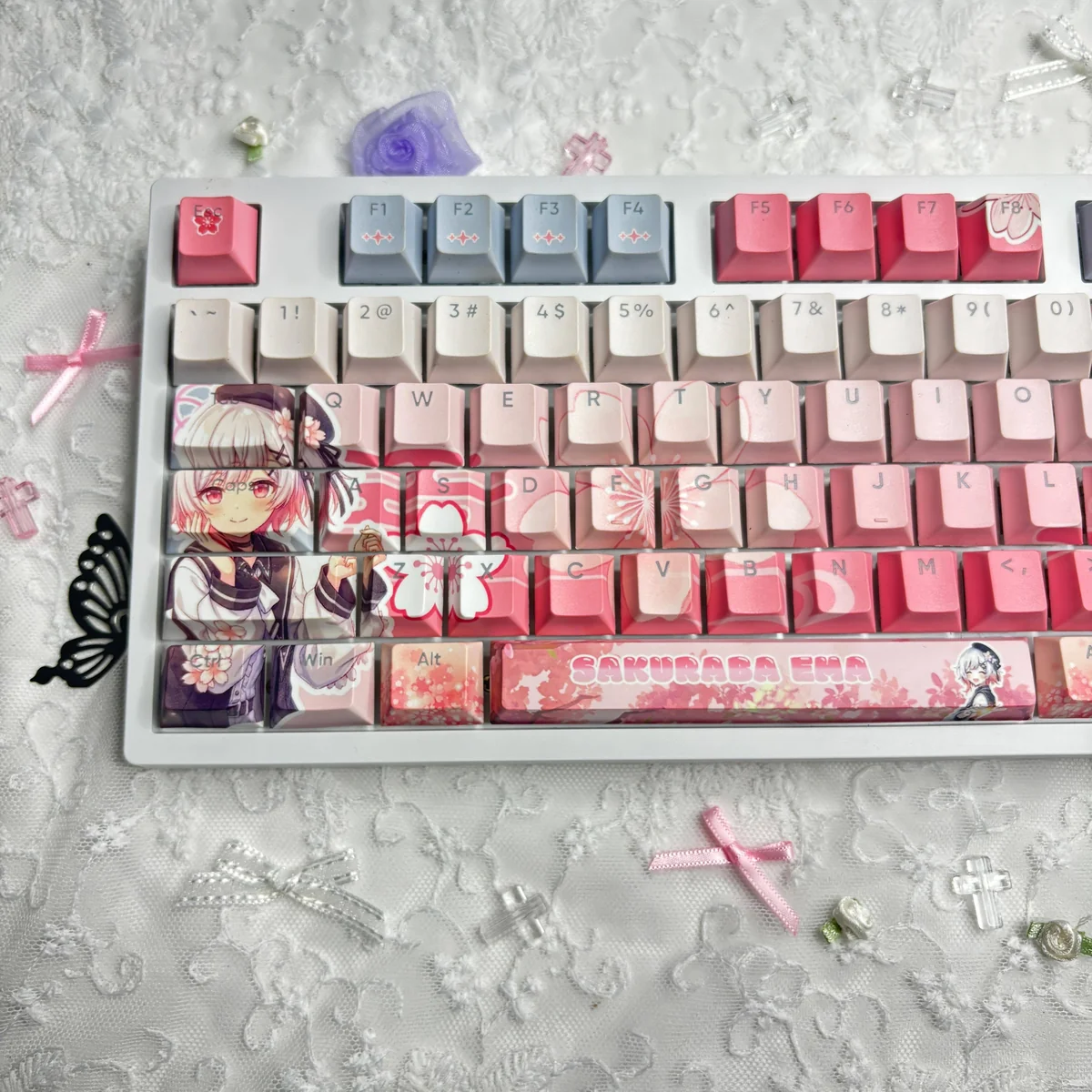 Exclusive Sakuraba Ema Magical Girl Dye-Sub PBT Keycaps Set. Gallery shows vibrant anime art, mystical 'witch trial' aesthetic from various angles.