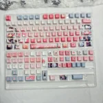 Close-up of the exclusive Sakuraba Ema Magical Girl Dye-Sub PBT keycaps set, showcasing the vibrant anime art and mystical witch trial aesthetic on a keyboard.