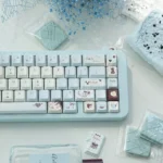 A detailed view of Sea Salt Choco Keycaps Set showcasing their tranquil ocean-inspired PBT dye-sublimated design, revealing gentle hues and delicate, artistic design.