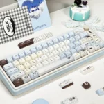 Angled view of Sea Salt Choco Keycaps Set, showcasing unique ocean PBT dye-sublimated design. Gentle sea hues and delicate accents create a serene, artistic design.