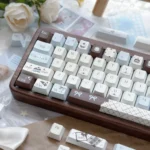 Detailed view of Sea Salt Choco Keycaps Set, showcasing the unique ocean-inspired PBT dye-sublimated legends. Gentle, serene hues and delicate accents create.