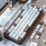 Artistic Sea Salt Choco Keycaps Set: a unique PBT dye-sublimated set featuring tranquil ocean hues and playful accents for a serene desktop.