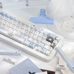 Pixel Cat Sea Salt PBT Keycap Set showcasing its unique pixel art cats and tranquil sea salt colors from various angles, blending retro charm.