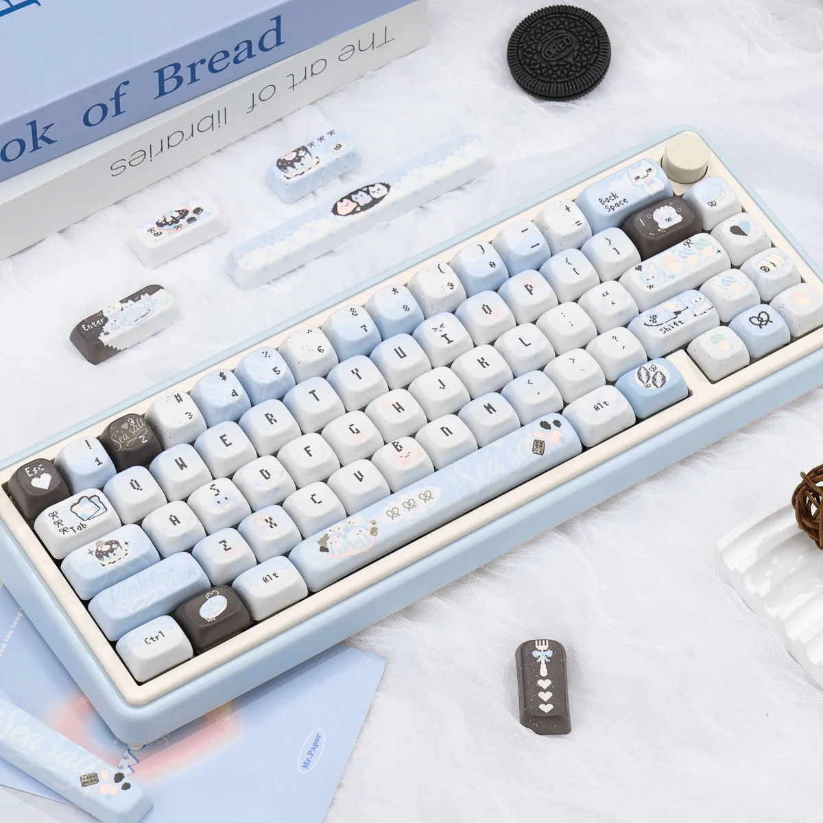 Pixel Cat Sea Salt PBT Keycap Set main image, highlighting unique pixel art cats in tranquil sea salt colors. Captures nostalgic charm and playful design.