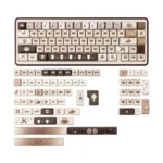 Close-up of the MAO Siamese Cat PBT dye-sub keycap set, featuring 133 keys in a charming cafe design, presented in its box.