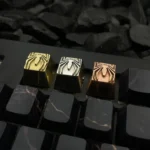 Premium pure copper Spider-Man logo keycap, showcasing intricate metallic details and a vintage patina finish. An iconic artisan collectible.