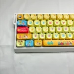 Vibrant SpongeBob PBT Dye-Sub MOA keycap set, showcasing iconic characters and Bikini Bottom scenes from all angles. Dive into fun!