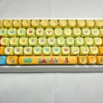Layout view of the vibrant SpongeBob PBT Dye-Sub MOA Keycap Set, showcasing iconic characters and fun Bikini Bottom scenes on durable PBT.