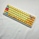 Detailed shot of the vibrant SpongeBob PBT Dye-Sub MOA Keycap Set, showcasing iconic characters and Bikini Bottom designs from a playful angle.