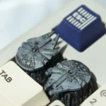 An array of iconic Star Wars resin artisan keycaps displayed from various angles, revealing the intricate details of legendary starships meticulously.
