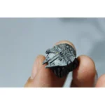 Close-up of multiple iconic Star Wars resin artisan keycaps, showcasing intricate starship designs from various angles, crafted with resin.