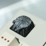 Detailed resin Star Wars keycap of an iconic starship replica from a new angle, showcasing intricate cinematic craftsmanship and premium artisan quality setup.